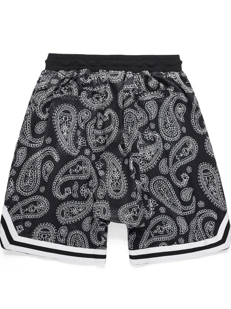 Paisley mesh basketball shorts in black with white accents and striped trim.