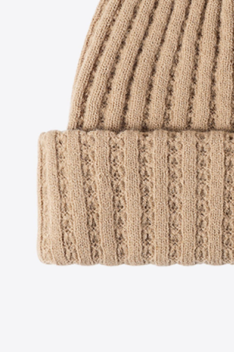 Beige ribbed knit beanie with textured detail