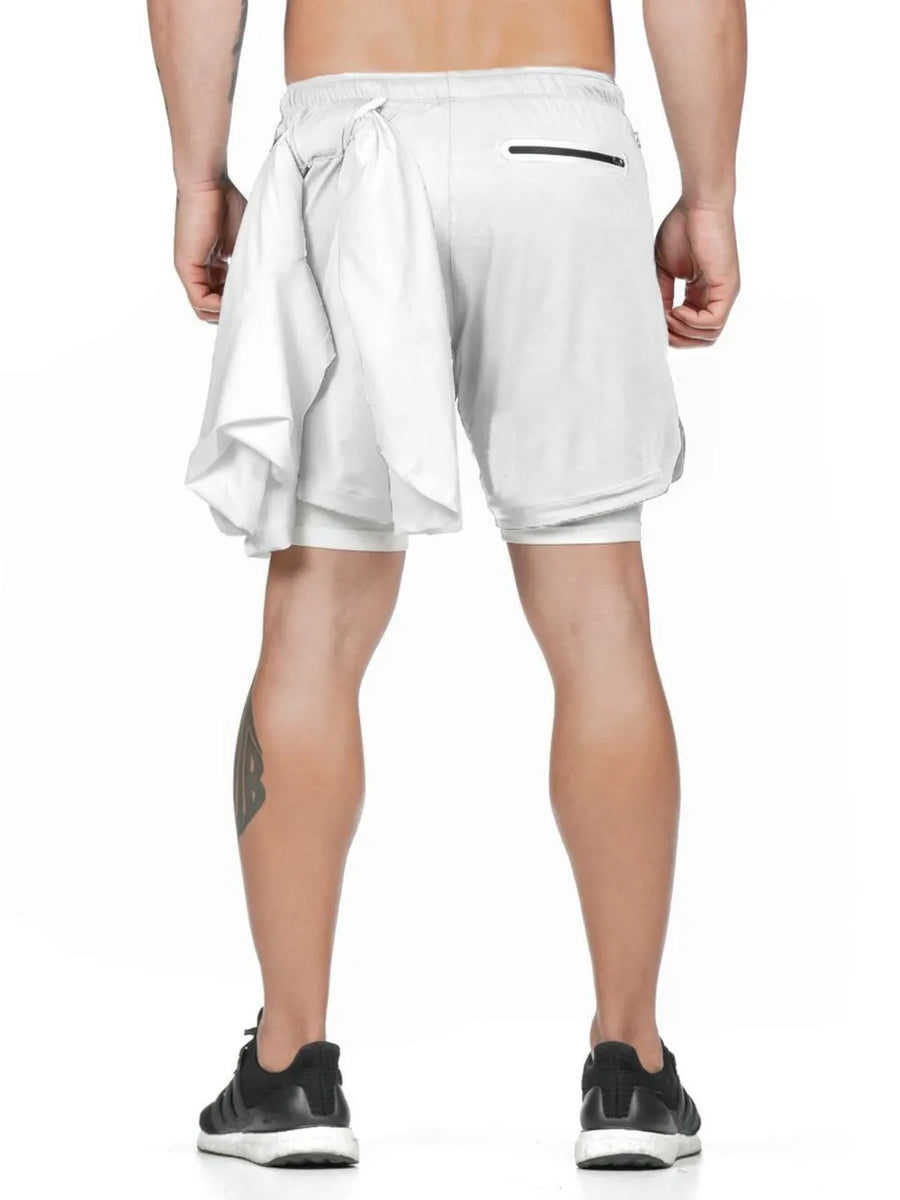 White layered performance shorts with built-in liner and towel loop.