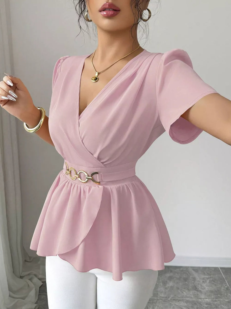Pink surplice blouse with flutter sleeves and gold chain belt detail