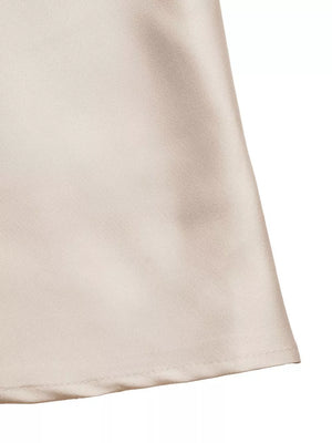 Lustrous V-neck maxi dress in champagne satin with spaghetti straps and a-line cut.