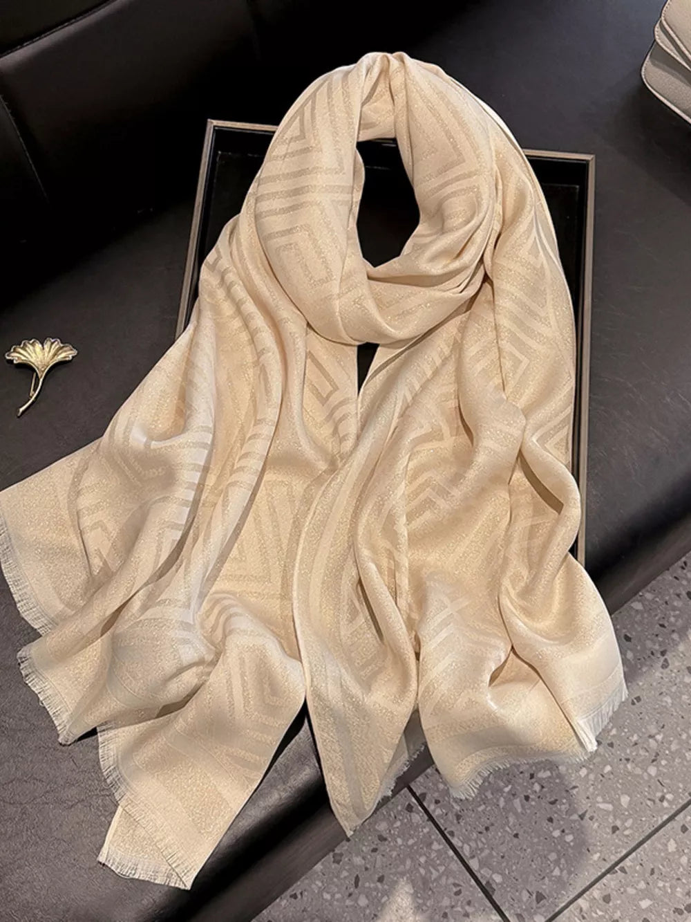 Beige Tencel cotton scarf with geometric pattern and fringe detail
