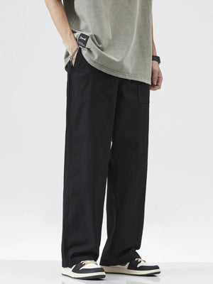 Black relaxed fit cargo trousers with a casual, straight leg cut and subtle panel detailing.