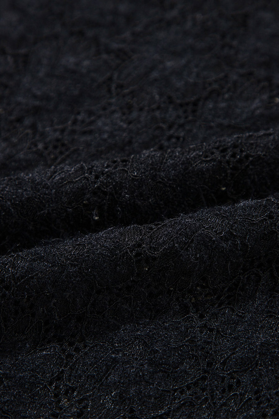 Black floral lace turtleneck top with a second-skin fit.