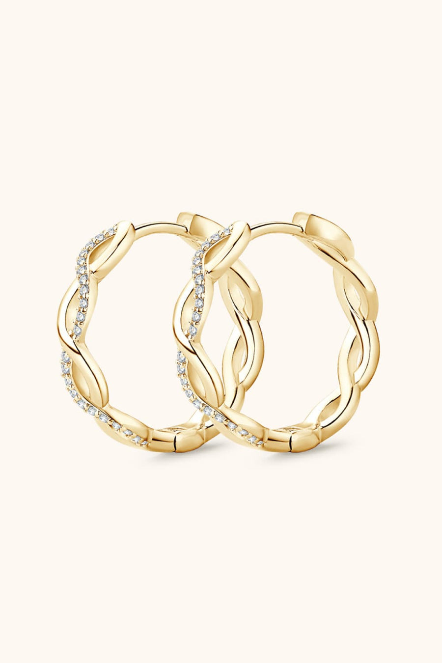Gold braided pavé hoop earrings with cubic zirconia detail