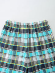 Boys' plaid shorts with elastic waistband in blue, gray, white, and yellow.
