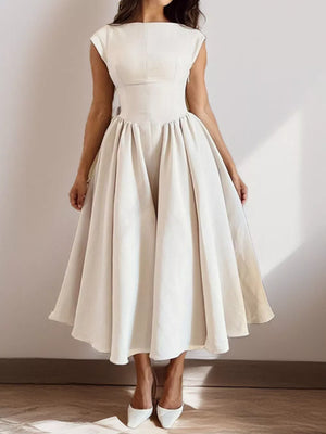 Elegant cream cap sleeve a-line midi dress with boat neck and full skirt.