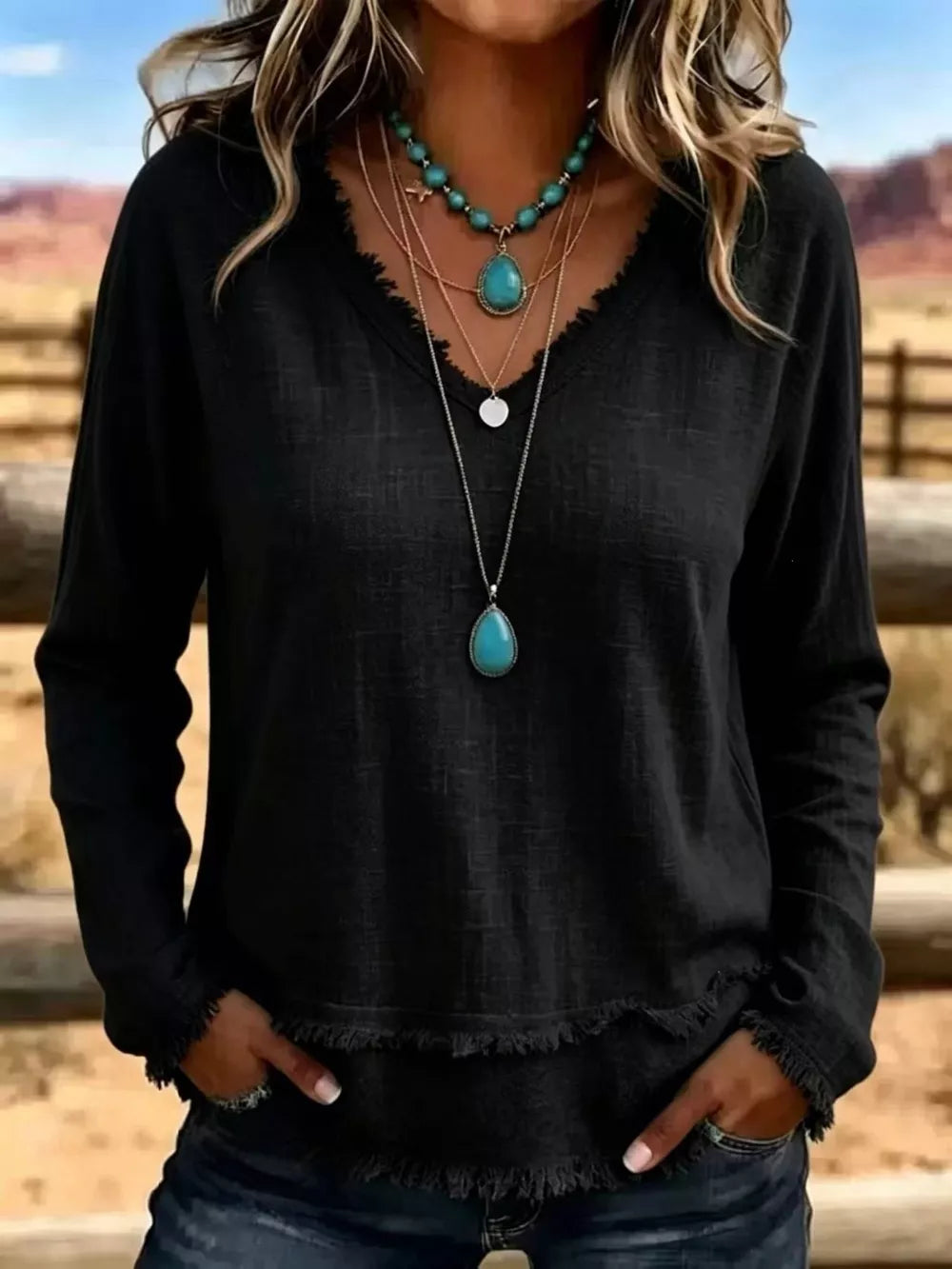 Pink blouse with frayed and long sleeve