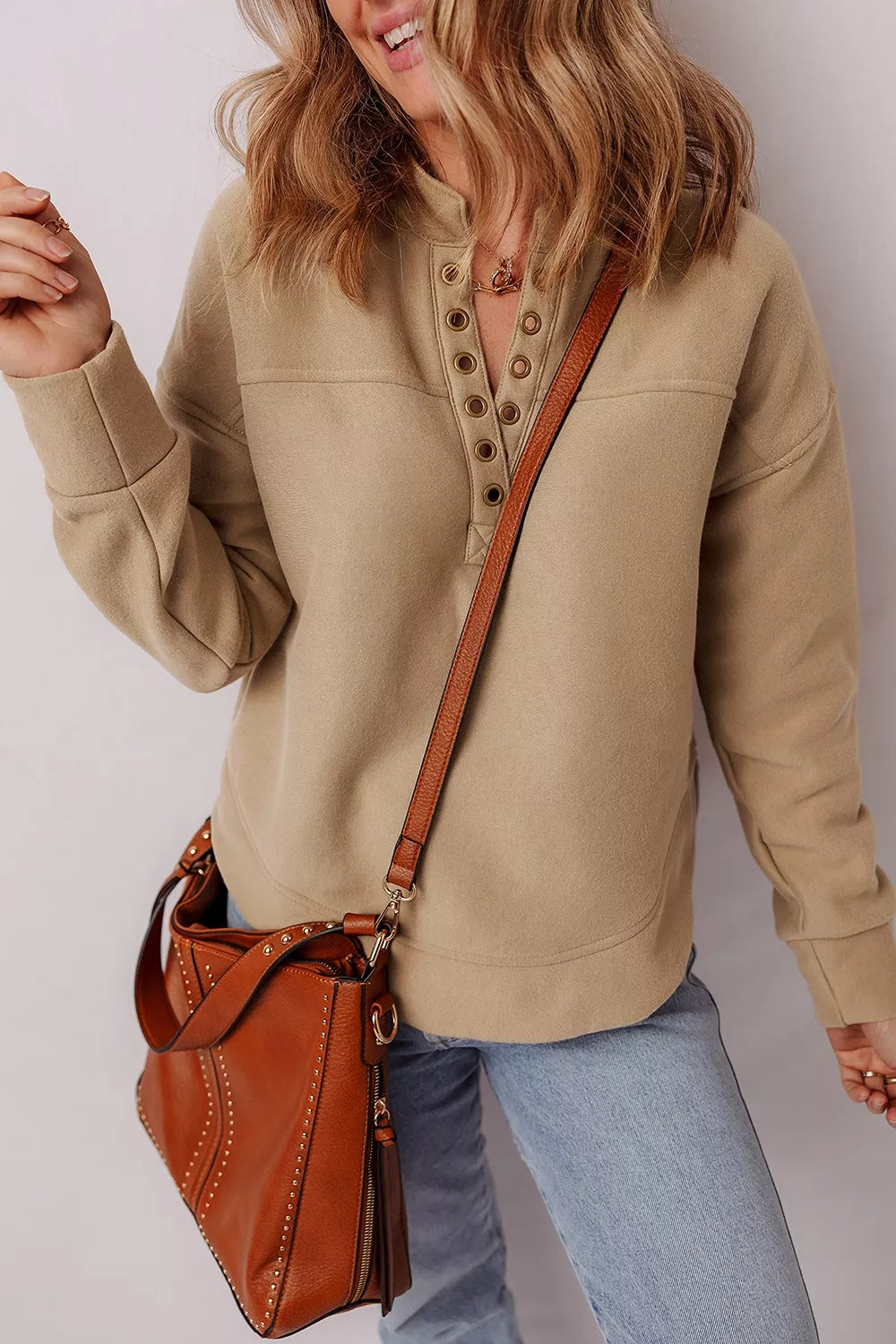 Khaki sweatshirt with hip-length and half-button