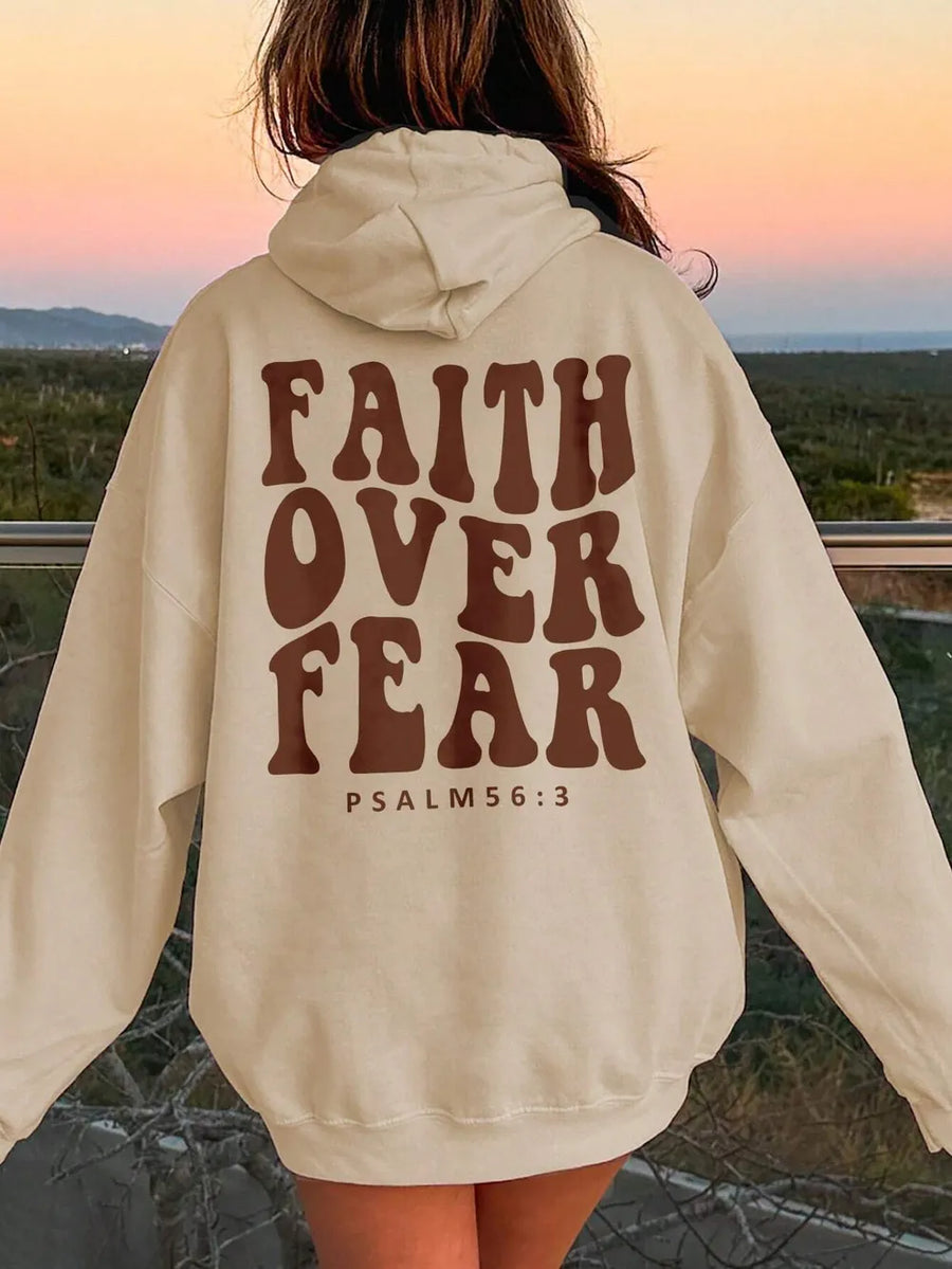 Tan graphic hoodie with Faith Over Fear and Psalm 56:3 text on back