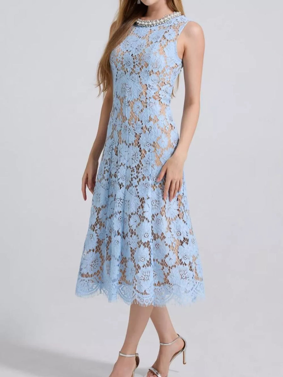 Blue lace dress with pearl embellished neckline and midi skirt.