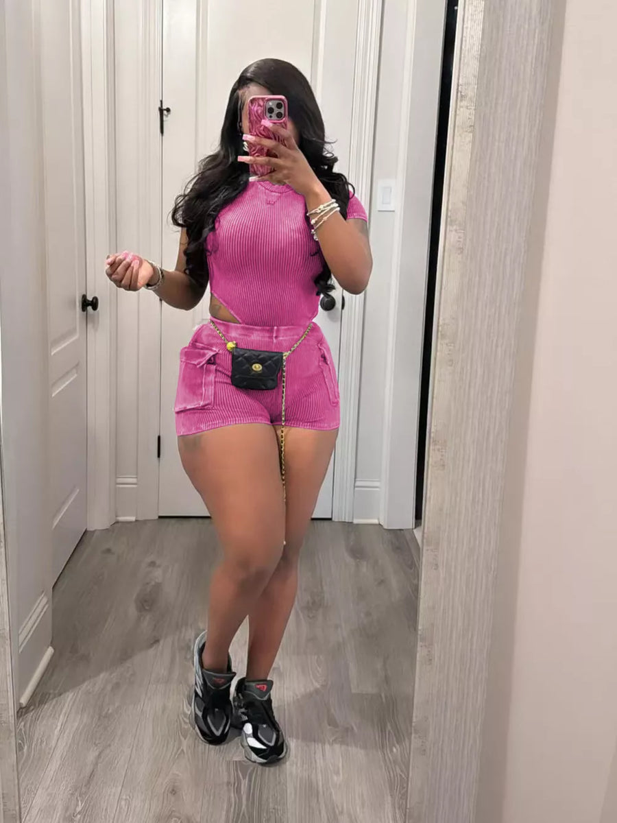 Rose Red ribbed crop top and pocket shorts set with a black quilted belt bag.