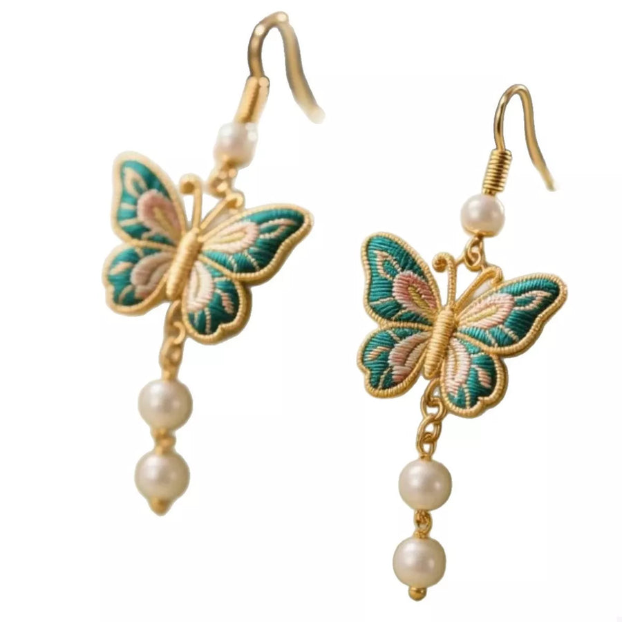 Gold butterfly dangle earrings with pearls and embroidered detail