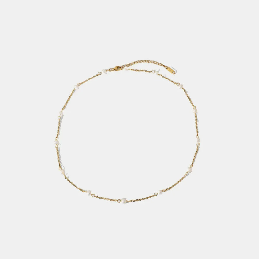 Gold chain necklace with small pearls, delicate and elegant for women.