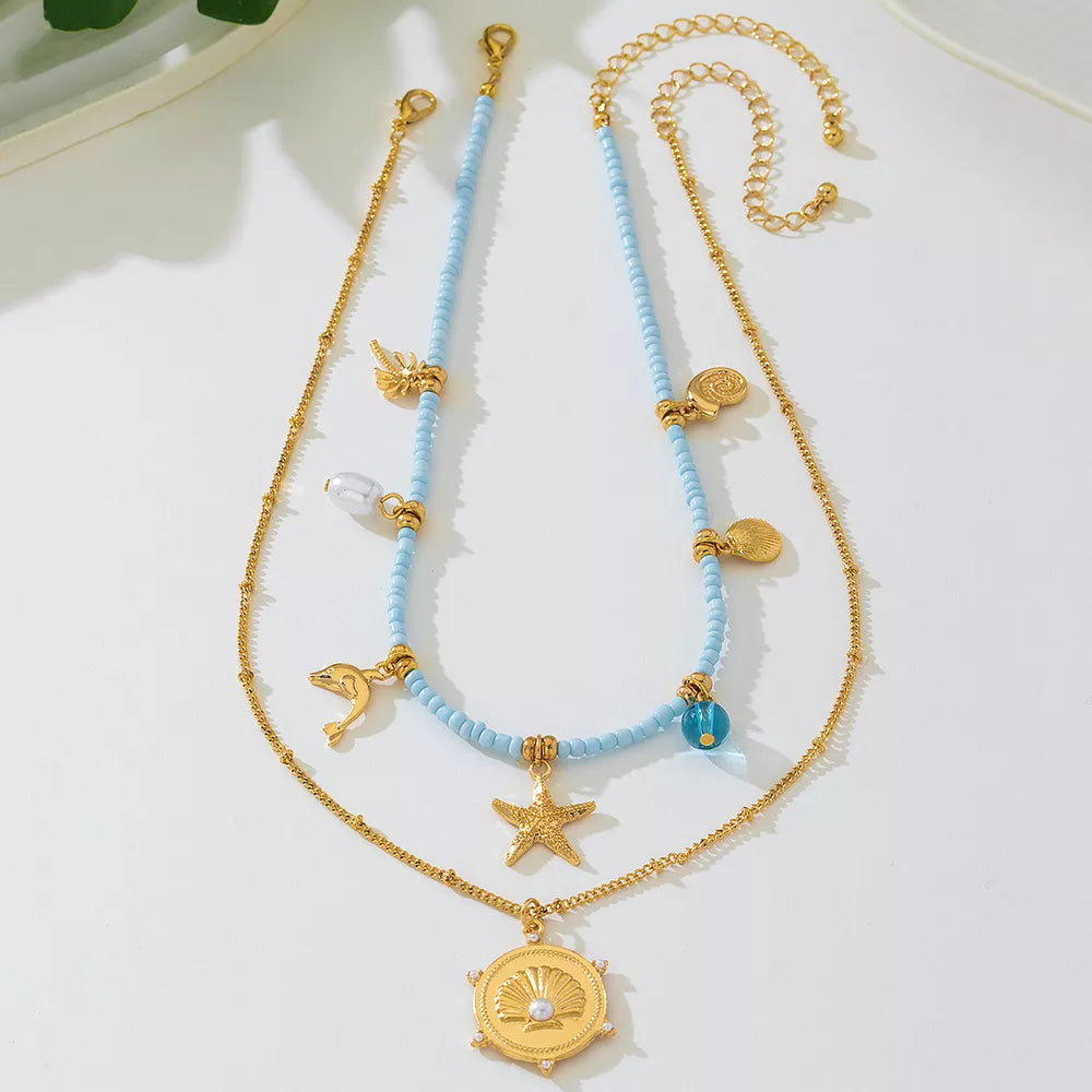 Synthetic Pearl,18K Gold-Plated,Alloy,Resin,Rice pearl Care instructions: Avoid necklace in gold with layered silhouette