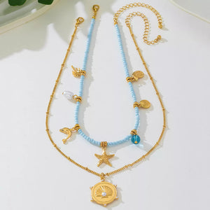 Synthetic Pearl,18K Gold-Plated,Alloy,Resin,Rice pearl Care instructions: Avoid necklace in gold with layered silhouette