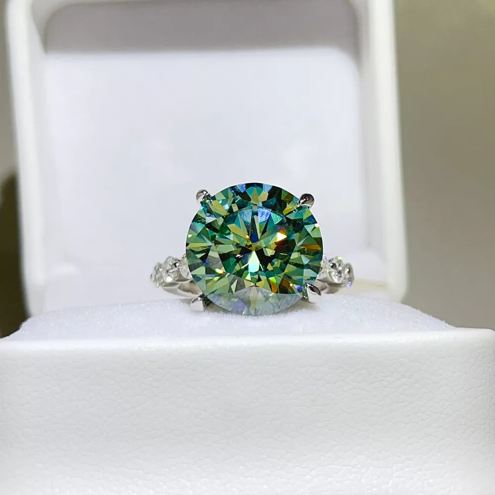 ring in green featuring large center stone and n/a fit