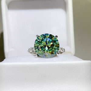 ring in green featuring large center stone and n/a fit