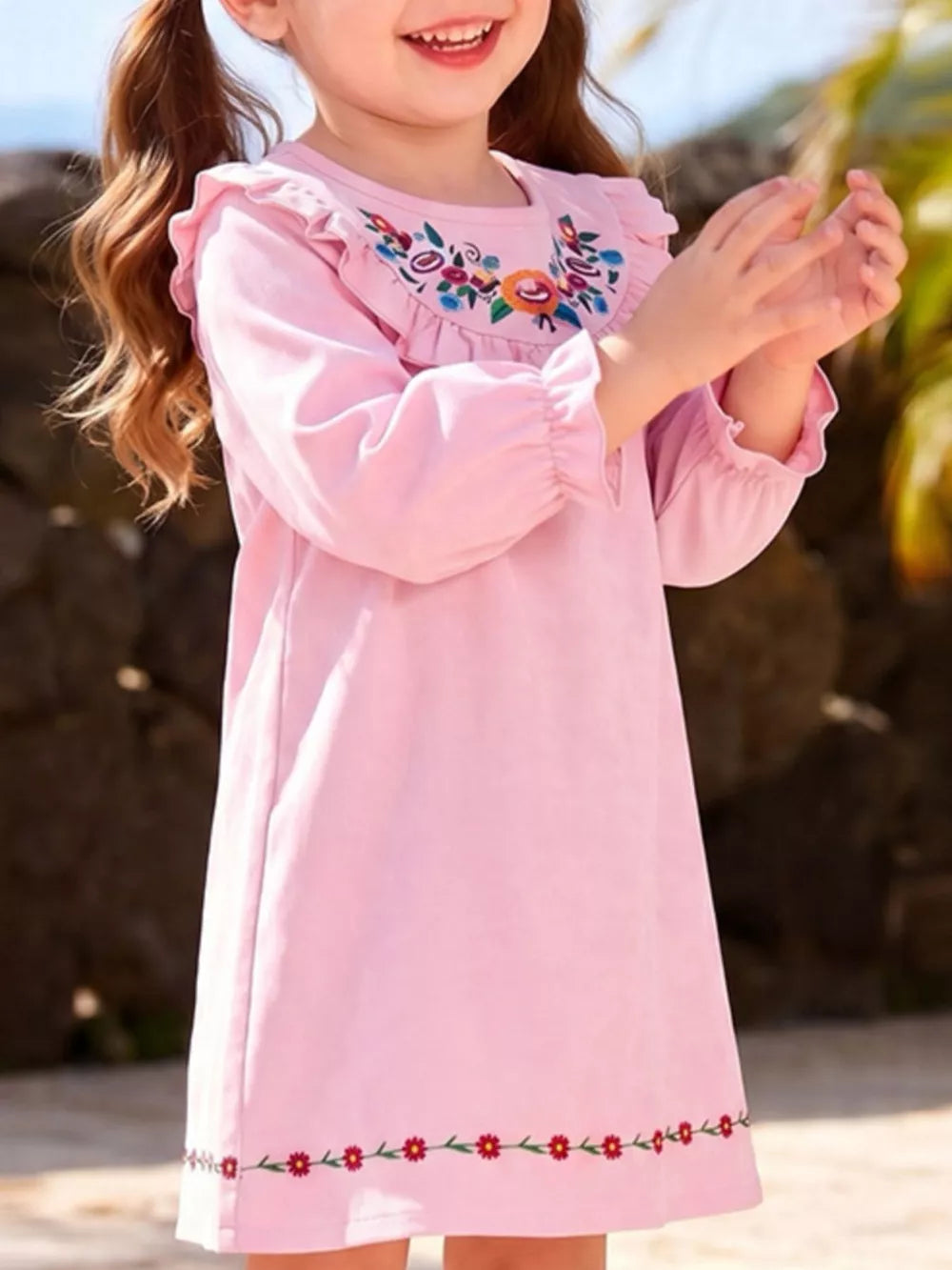 Pink A-line dress featuring frill and floral