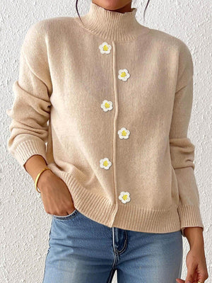 cardigan in beige featuring decorative buttons and relaxed fit