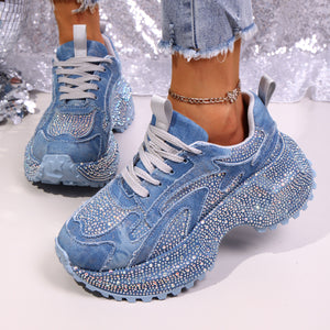 Blue denim rhinestone platform sneakers with chunky soles and white laces.