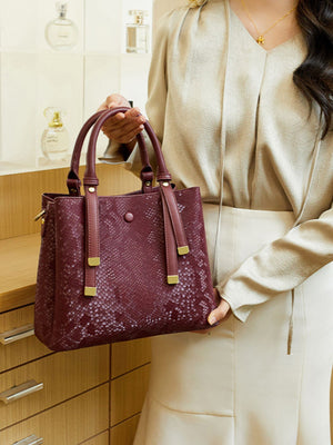 handbag featuring snakeskin in burgundy with PU Leather Imported Size &amp texture