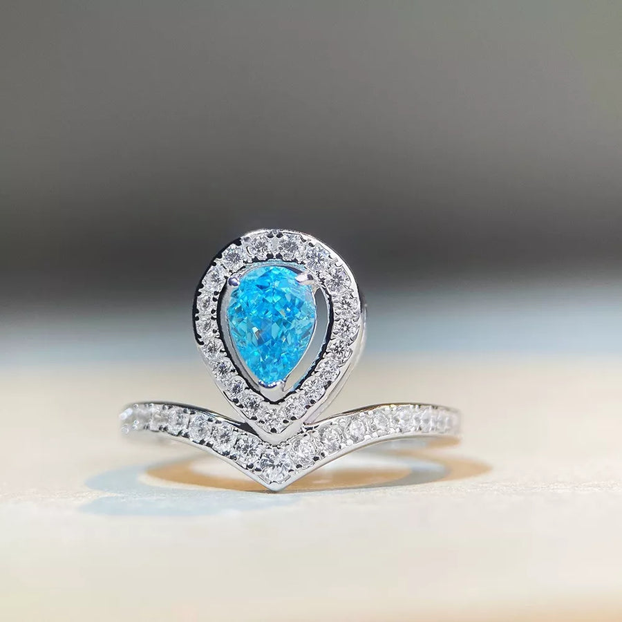 925 sterling silver,Zircon Care instructions: Avoid wearing during exercise, as ring in light blue with fitted silhouette