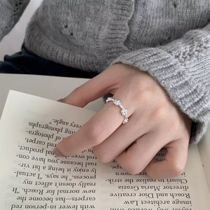 ring in silver with floral and flower motif