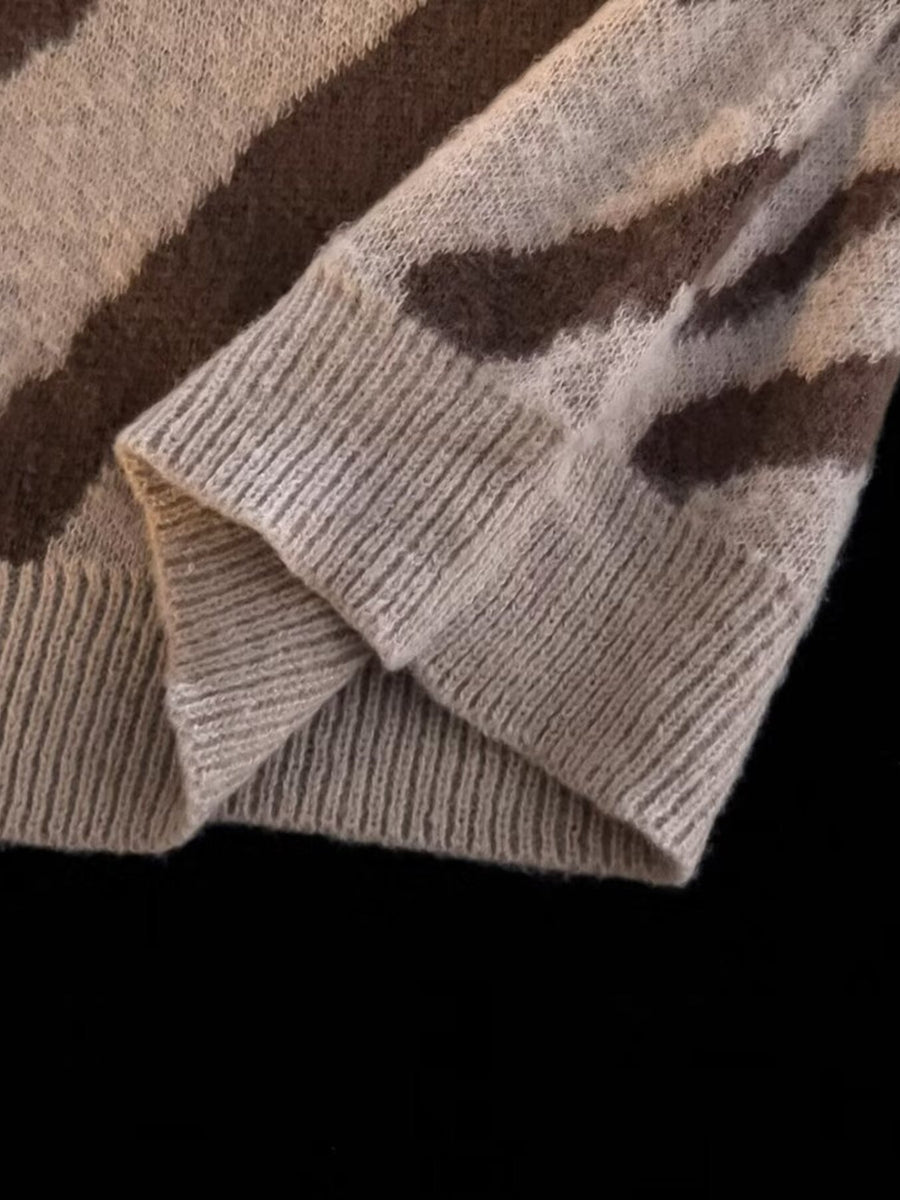Beige and brown striped knit sweater with ribbed cuffs