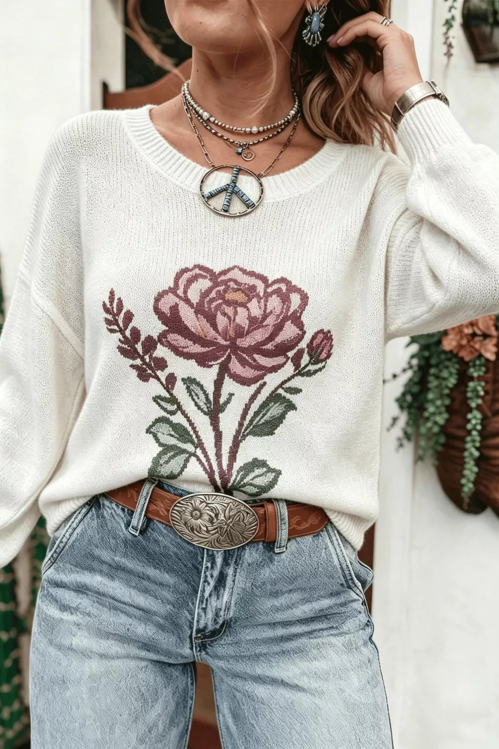 rose pullover sweater featuring dropped shoulder and floral