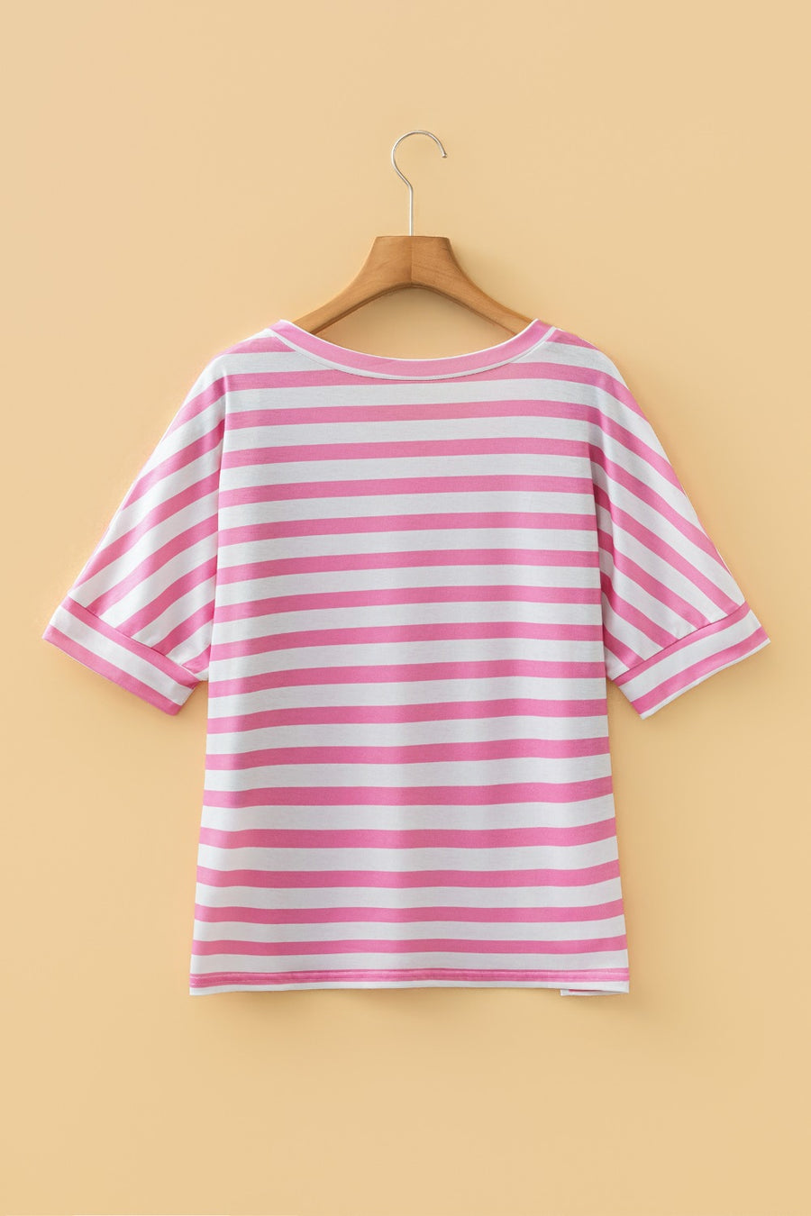 Striped blush pink and white t-shirt with short sleeves and a rounded neckline.