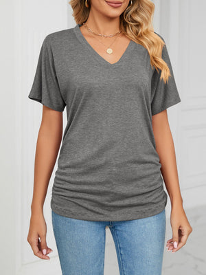 Relaxed grey V-neck short sleeve t-shirt with ruched side detail.