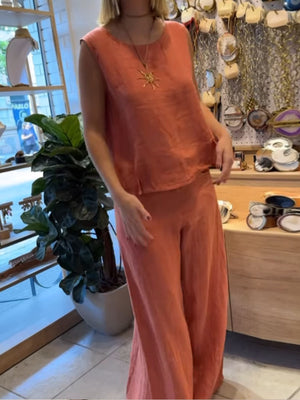 Apricot relaxed fit tank and wide-leg pants set with round neckline and sleeveless top.