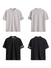 Men's short sleeve polo shirts in camel and black with striped sleeves.