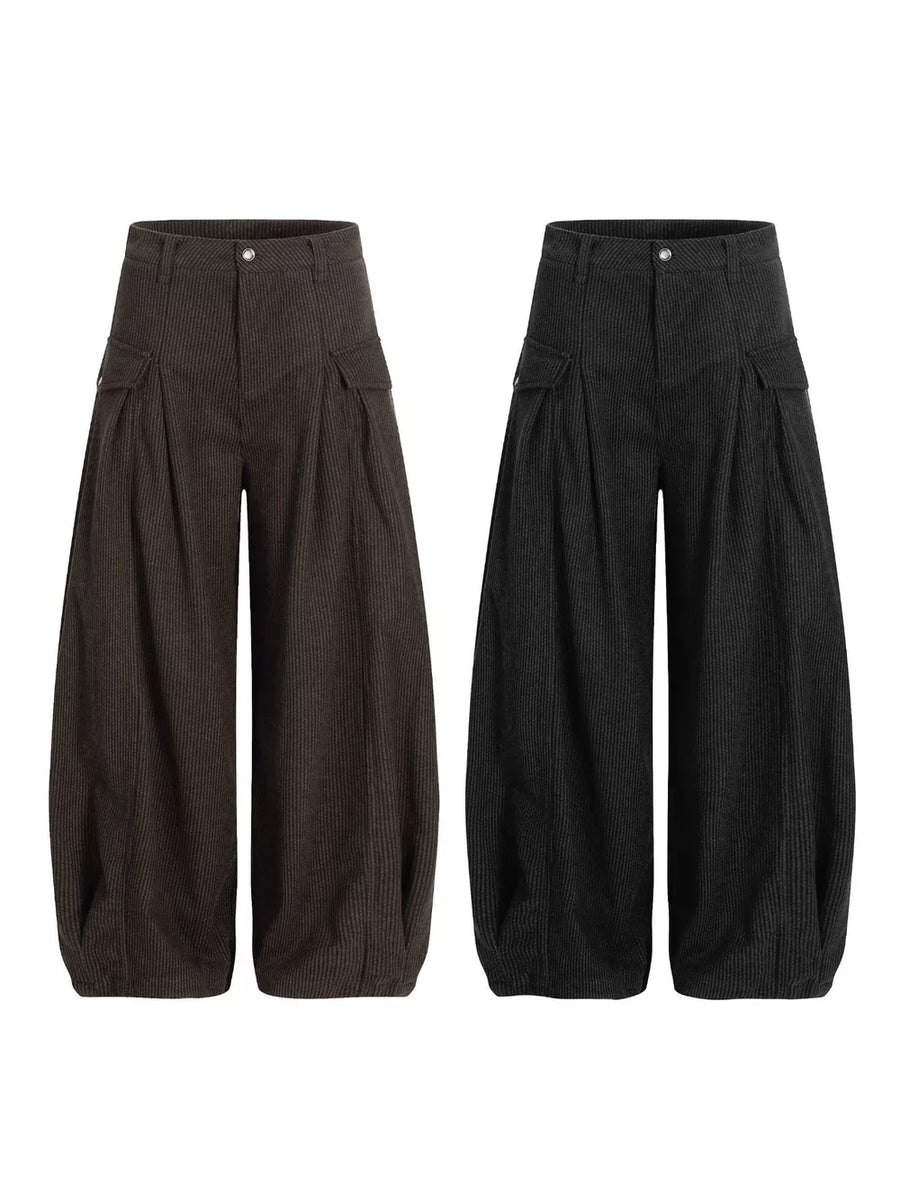 Corduroy wide-leg pleated sweatpants in black and brown with cargo pockets.