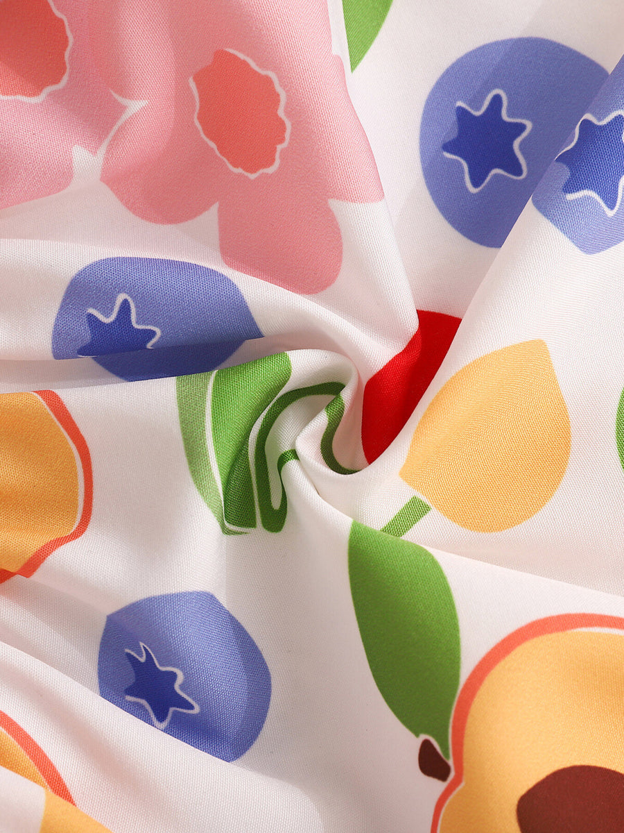 Fruit print bikini set with flowers and blueberries on white cotton fabric.