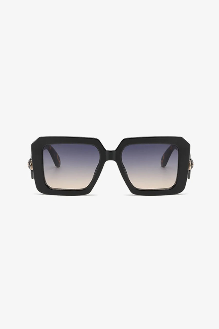 Black geometric facet sunglasses with gradient lenses and embellished temples.