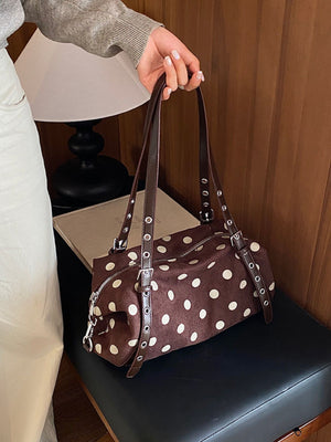 Black shoulder bag with zip-front and polka dot