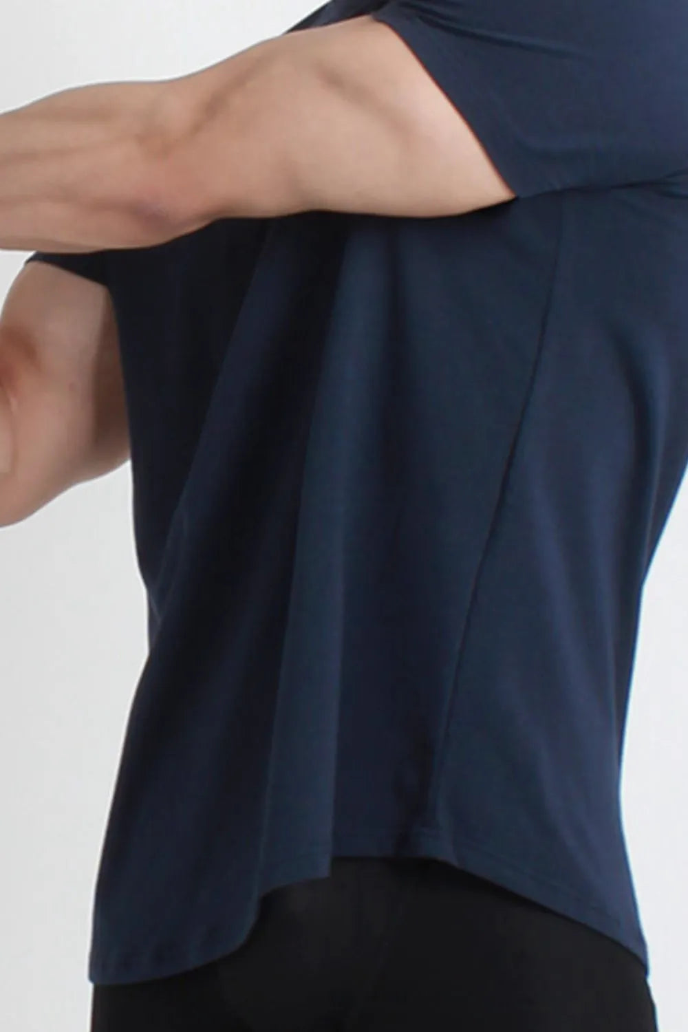 Navy performance tee with sculpted hemline detail