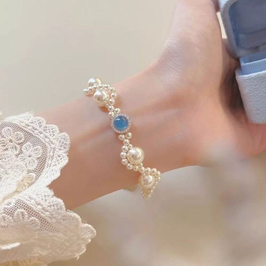 Synthetic Pearl,925 sterling silver,Crystal,Zircon Care instructions: Avoid wear bracelet in silver with fitted silhouette