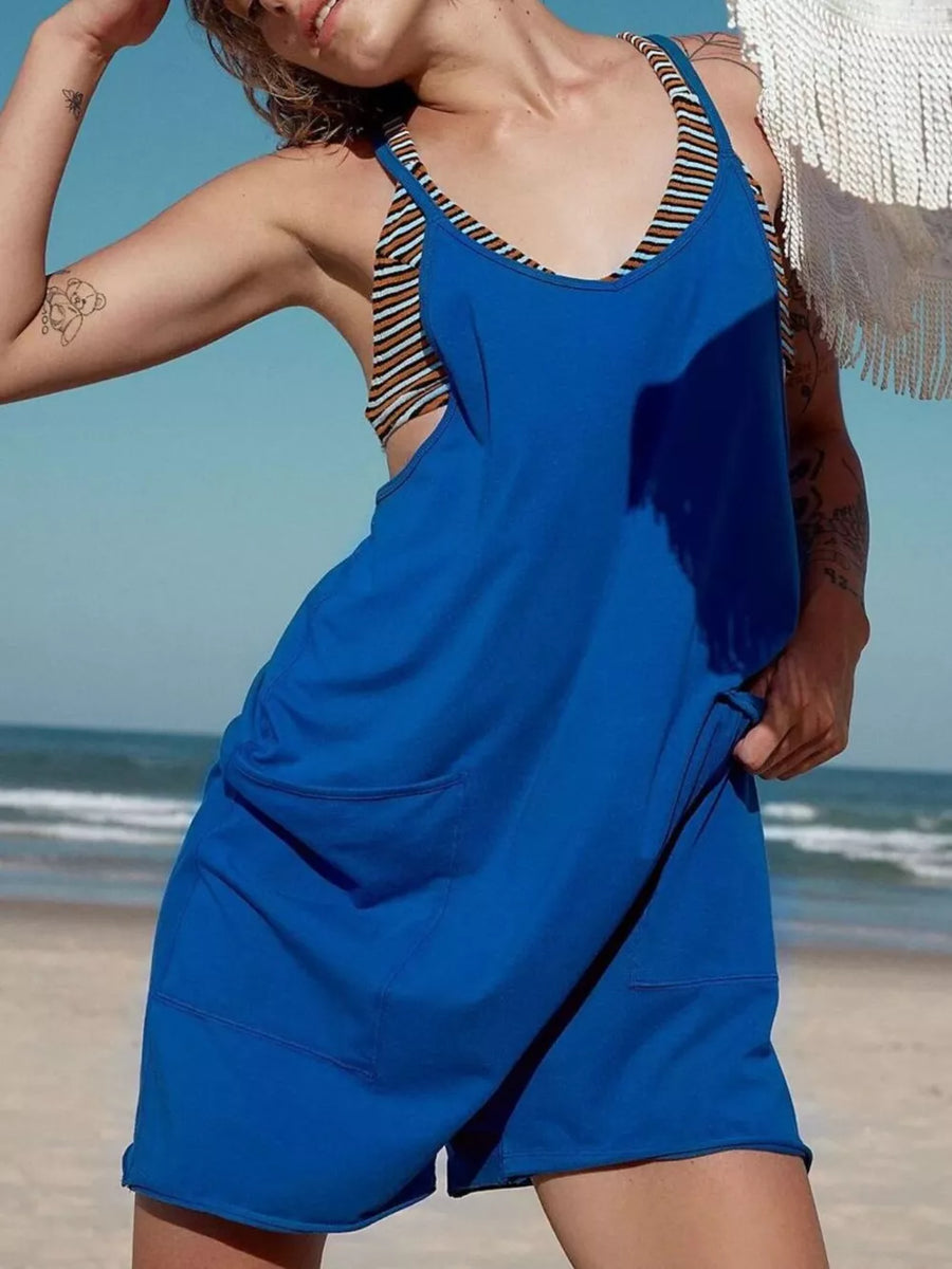 Blue cotton romper with striped tank top and patch pockets