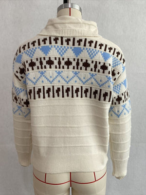 polo sweater featuring Fair Isle in cream with 100% polyester Care instructions: Machine wash cold texture