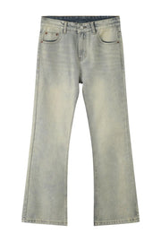 Vintage wash flare denim trousers in light blue with a faded effect.