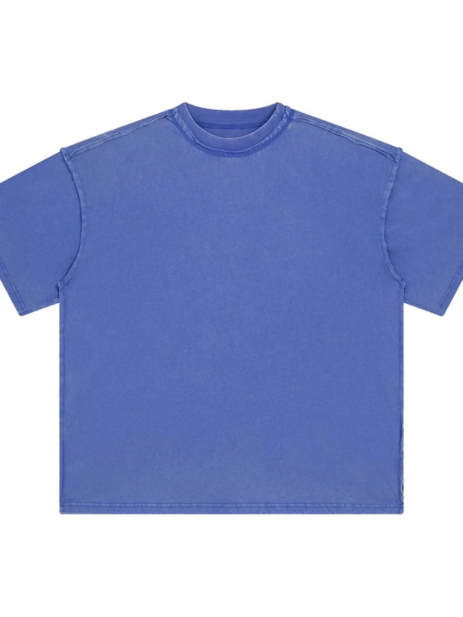 Blue washed cotton t-shirt with raw seams and crewneck.
