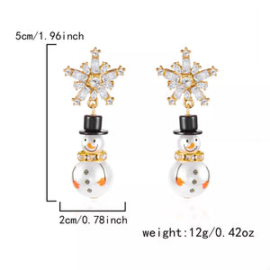 earrings in white with novelty and rhinestone embellishment