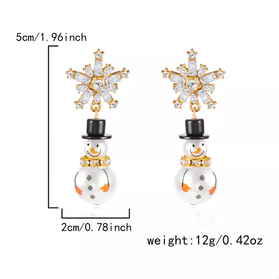 earrings in white with novelty and rhinestone embellishment