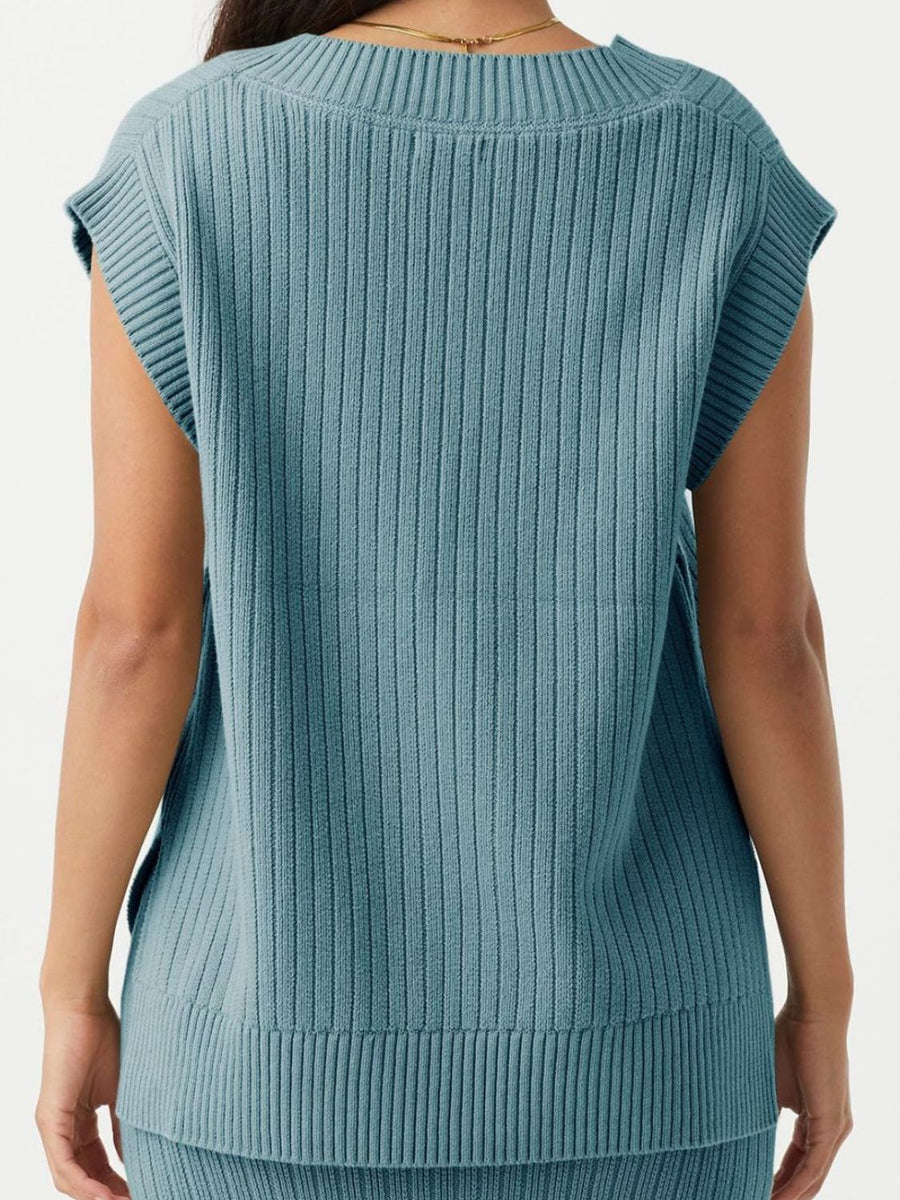 Air Force Blue ribbed knit V-neck tank sweater with cap sleeves and a sculpted fit.