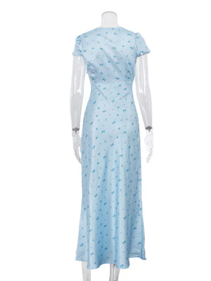 Light blue floral print midi dress with short sleeves and a V-neck.