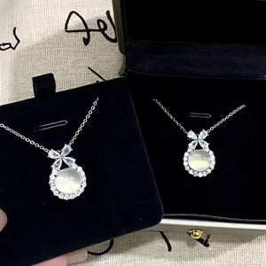 Sterling silver pendant necklace with chalcedony and cubic zirconia in a butterfly design.