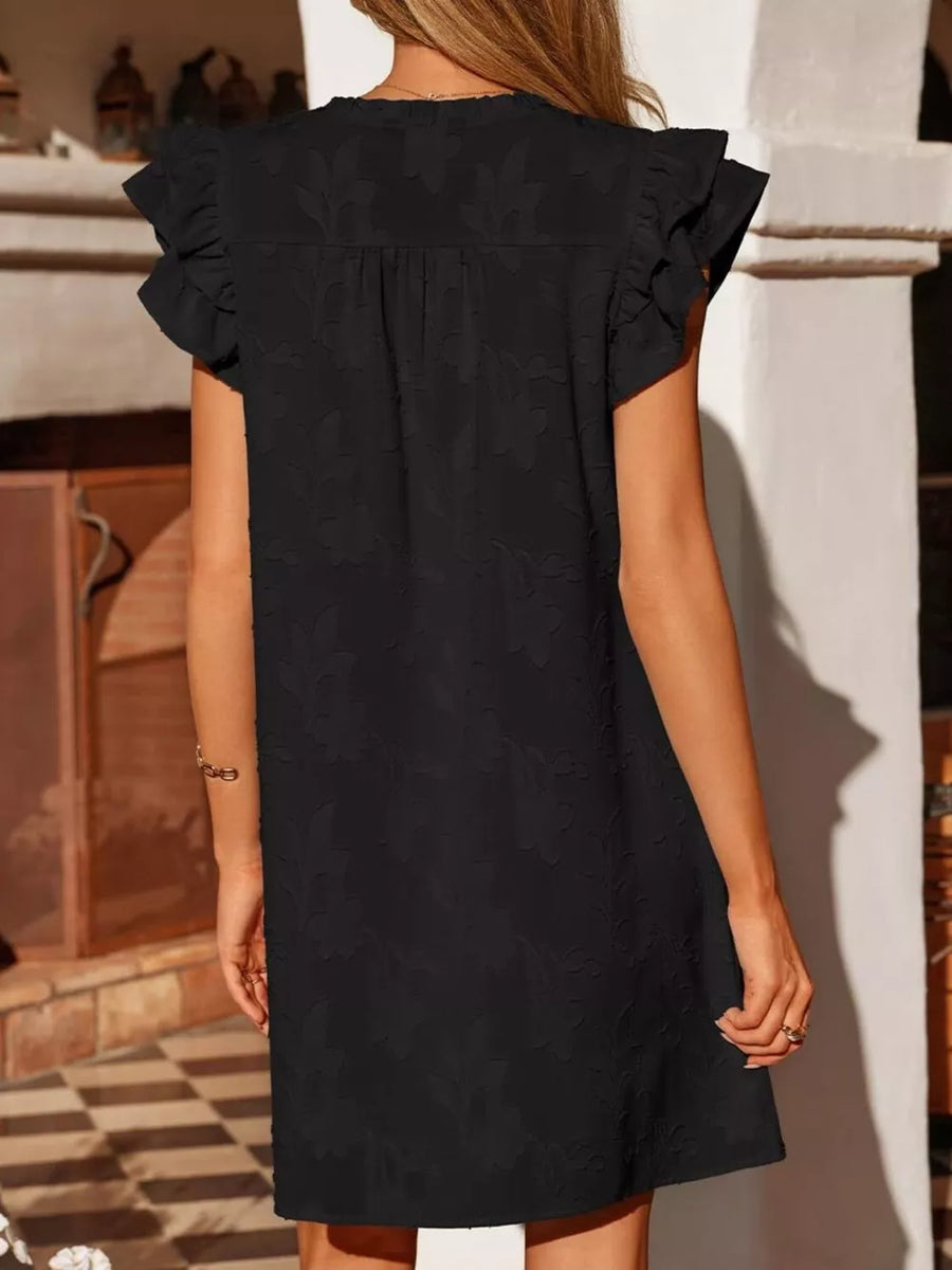 Black floral embossed mini dress with ruffled sleeves and a V-neckline.